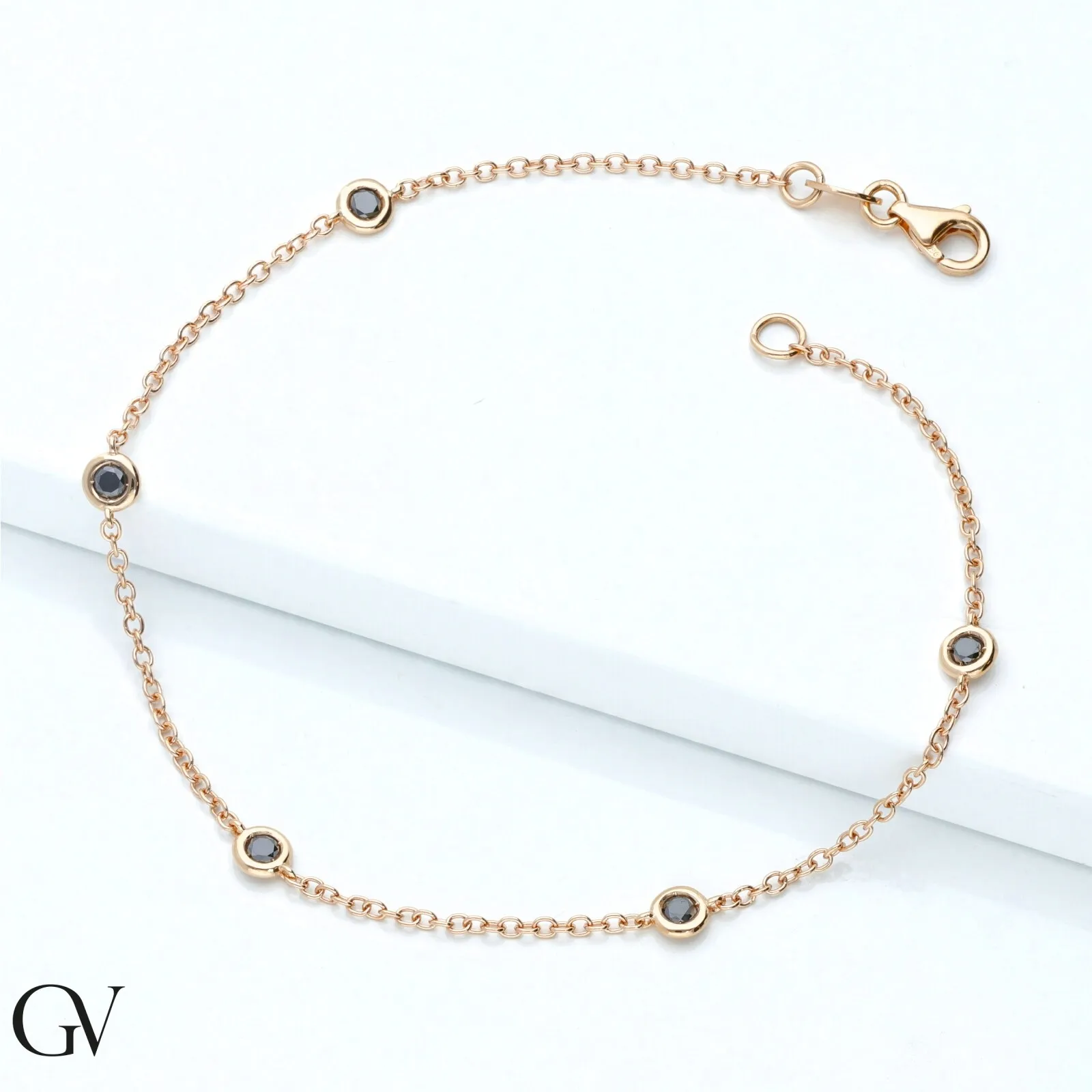 Bracciale in oro rosa 18k con diamanti neri, lunghezza 20 cm.